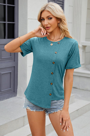 Teal asymmetric button-up tee with short sleeves and a rounded hem.