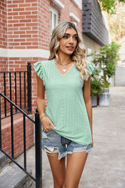 Light Green lace trimmed flutter sleeve blouse with eyelet detail and V-neck
