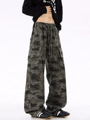 Urban camouflage cargo sweatpants with drawstring waist and multiple pockets.