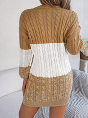 Colorblock cable knit mini dress in camel and white acrylic with a textured pattern.