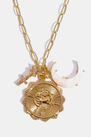 Gold Sagittarius zodiac pendant necklace with moon and arrow charms