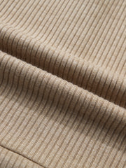 Cozy ribbed knit maternity shirt in beige with subtle denim accents.