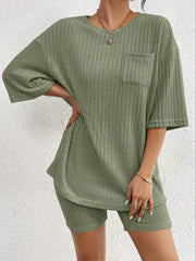Sage ribbed loungewear set with a pocket tee and biker shorts.