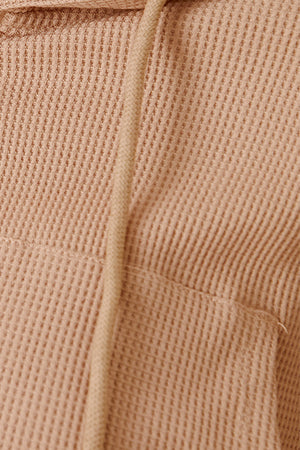 Waffle knit cropped zip hoodie in khaki with drawstring and pocket detail.
