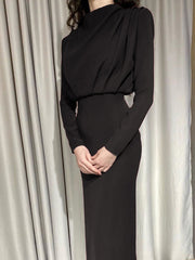 Black mock neck maxi dress with ruched bodice and defined waist
