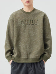 Men's Army Green long-sleeve sweatshirt with textured "ENJOY" graphic and marbled pattern.