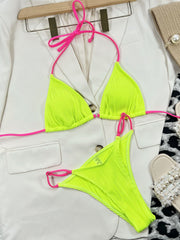 Neon ribbed triangle bikini set with pink ties, shown with a white blazer.