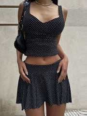 Black polka dot crop top and flared mini skirt set with sweetheart neckline