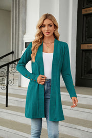 Turquoise textured knit open-front duster cardigan with button detail on sleeves.