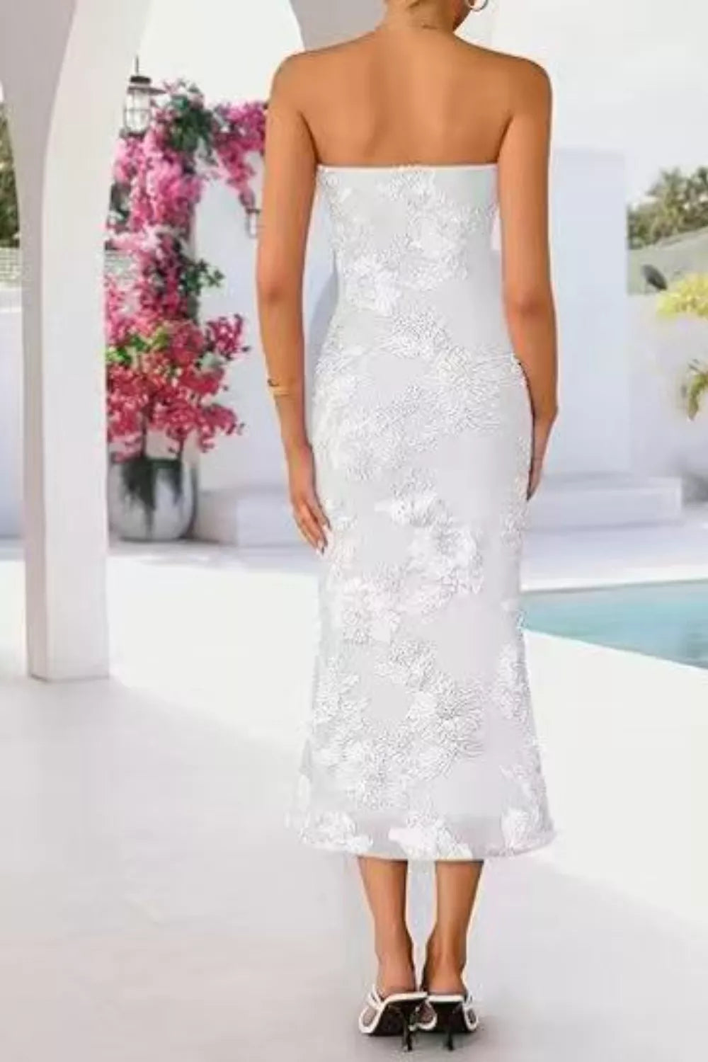 White strapless midi dress with lace overlay and a fitted silhouette.