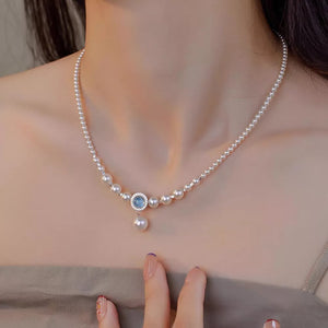 Luminous pearl choker with cream pearls and blue stone pendant on 925 silver chain