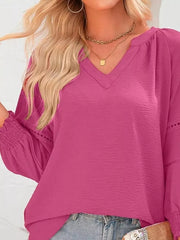 Elegant smocked long sleeve blouse in Rose Purple polyester with V-neck and cinched cuffs.
