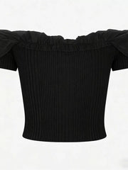 Black off-shoulder ruffled knit maternity t-shirt with short sleeves.