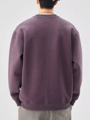 Men's oversized purple crewneck sweatshirt with ribbed cuffs and hem