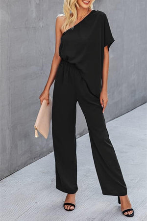 Black asymmetric drape-sleeve wide-leg jumpsuit with elastic waist