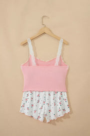 Pink lace-trimmed pajama set with floral print shorts