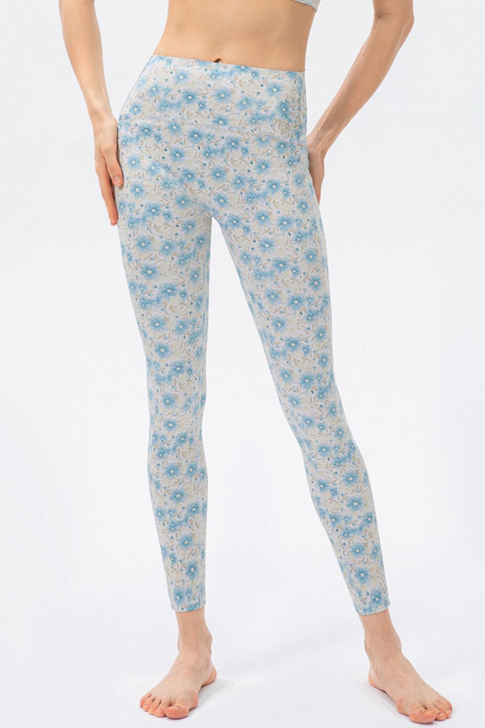 Light blue floral print skinny leggings with a high waist.
