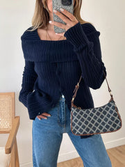 Navy textured knit maternity cardigan with square neckline and button front.