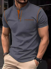 Dark Gray polo shirt with mandarin collar, contrast orange stitching, and chest pocket.
