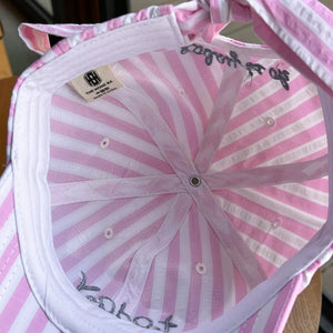 Pink and white striped cotton baseball cap interior with embroidered detail