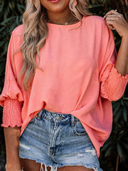 Textured sleeve blouse in burnt coral with elastic cuffs