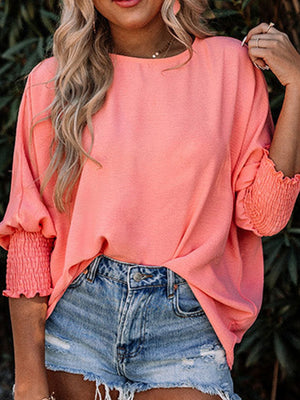 Textured sleeve blouse in burnt coral with elastic cuffs