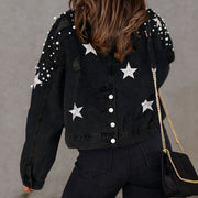 Black denim jacket with pearl and star embellishments