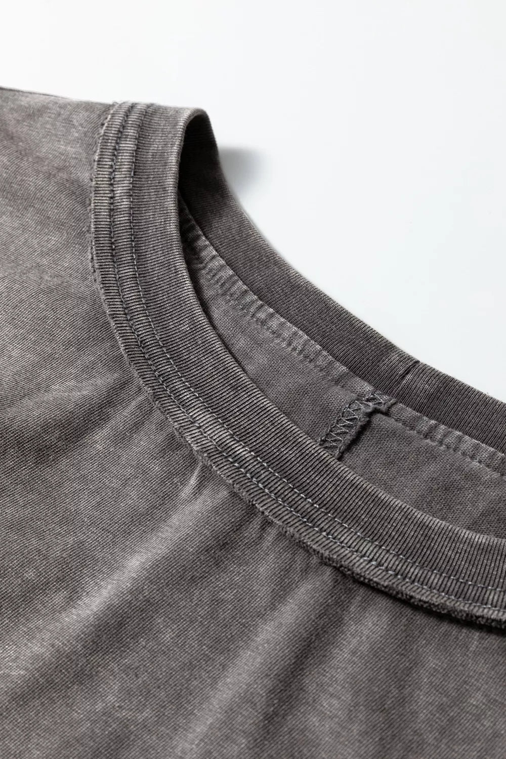 Relaxed mineral wash cotton tank top with crew neck detail.