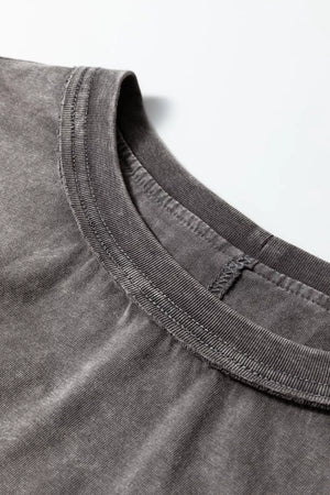 Relaxed mineral wash cotton tank top with crew neck detail.