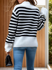 Breton stripe knit sweater with wide collar and ribbed cuffs, styled with blue jeans.