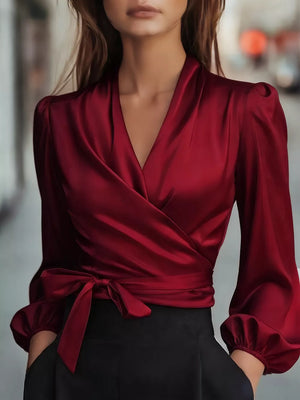 Elegant Satin Wrap Blouse With Bow Detail in Black, front view