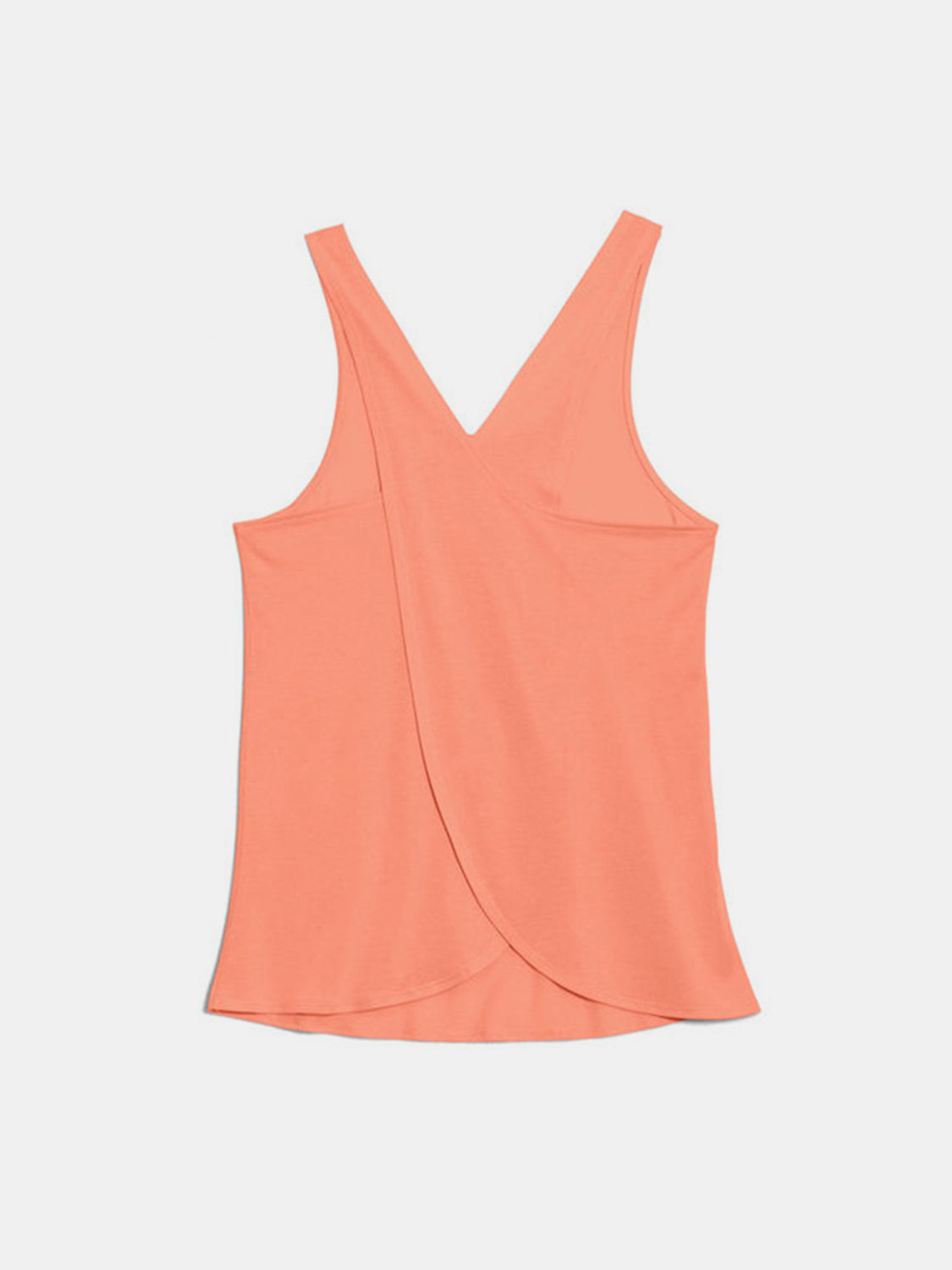 Coral cross-back flow tank top with a V-neck and tulip hem.