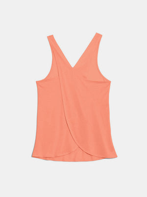 Coral cross-back flow tank top with a V-neck and tulip hem.