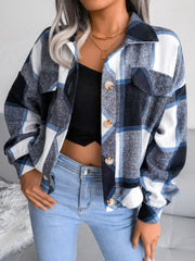 Oversized blue tartan shacket with patch pockets and button front.