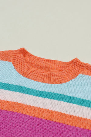 Rainbow stripe knit sweater with crew neck and ribbed trim.