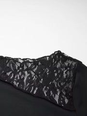 Black maternity tee with asymmetrical lace detail on shoulder and sleeve