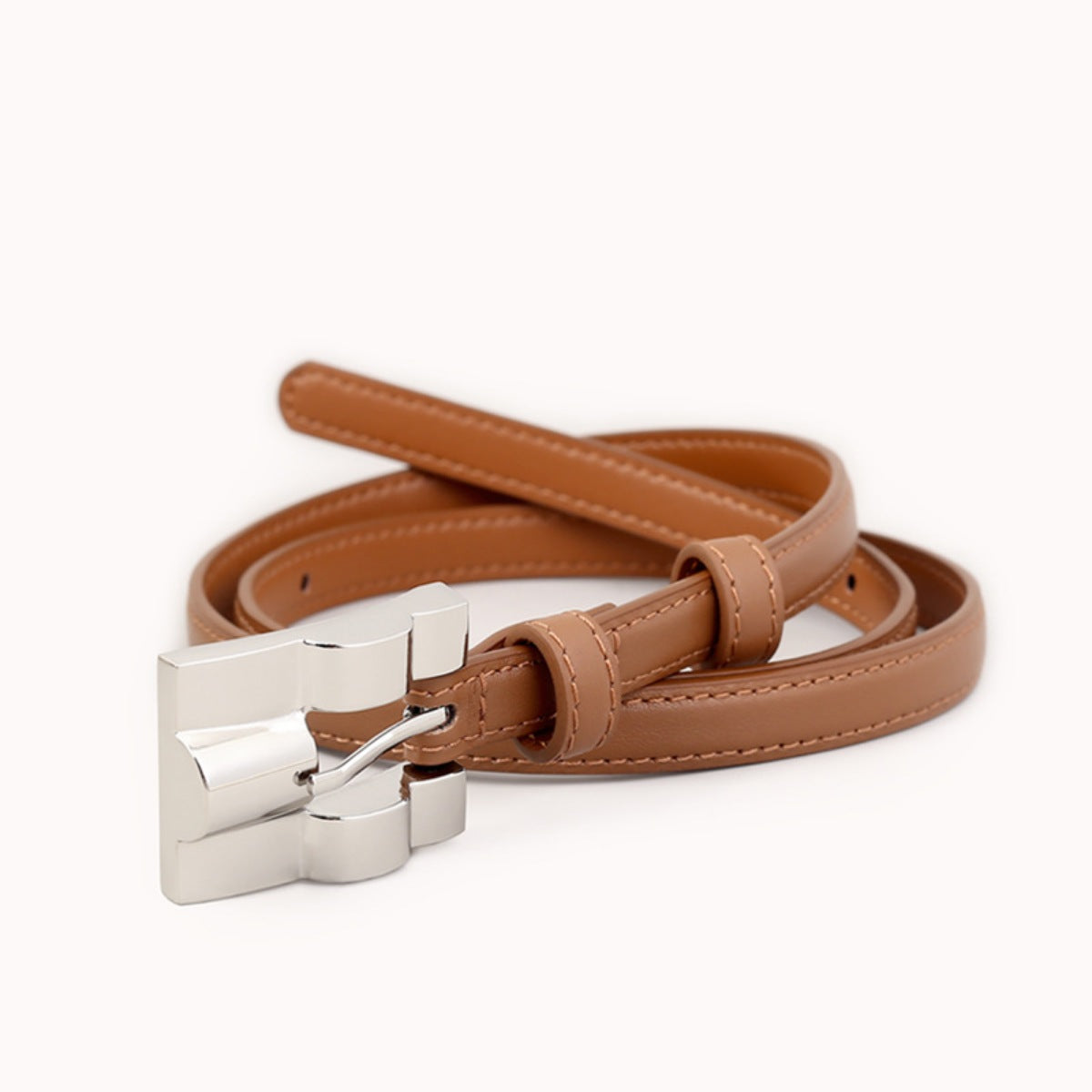Slim brown cowhide leather belt with silver buckle