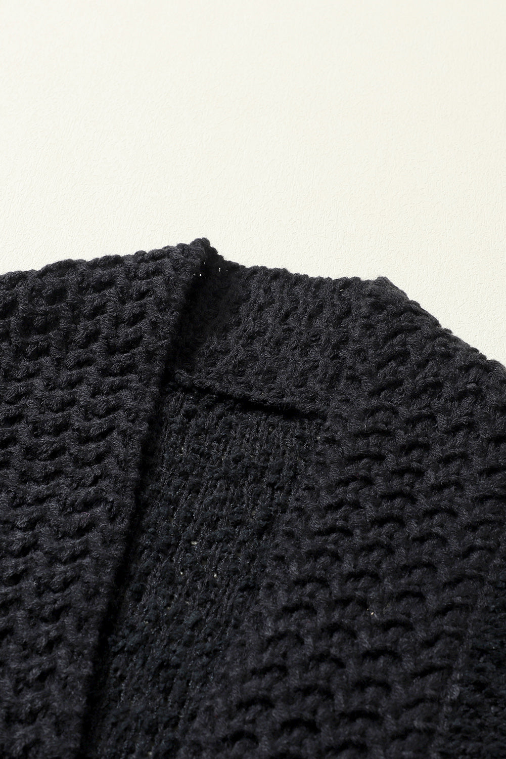 Black textured bouclé knit bolero jacket detail