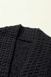 Black textured bouclé knit bolero jacket detail