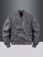 Gray bomber jacket with zip front, ribbed collar, cuffs, and hem, and utility pocket.