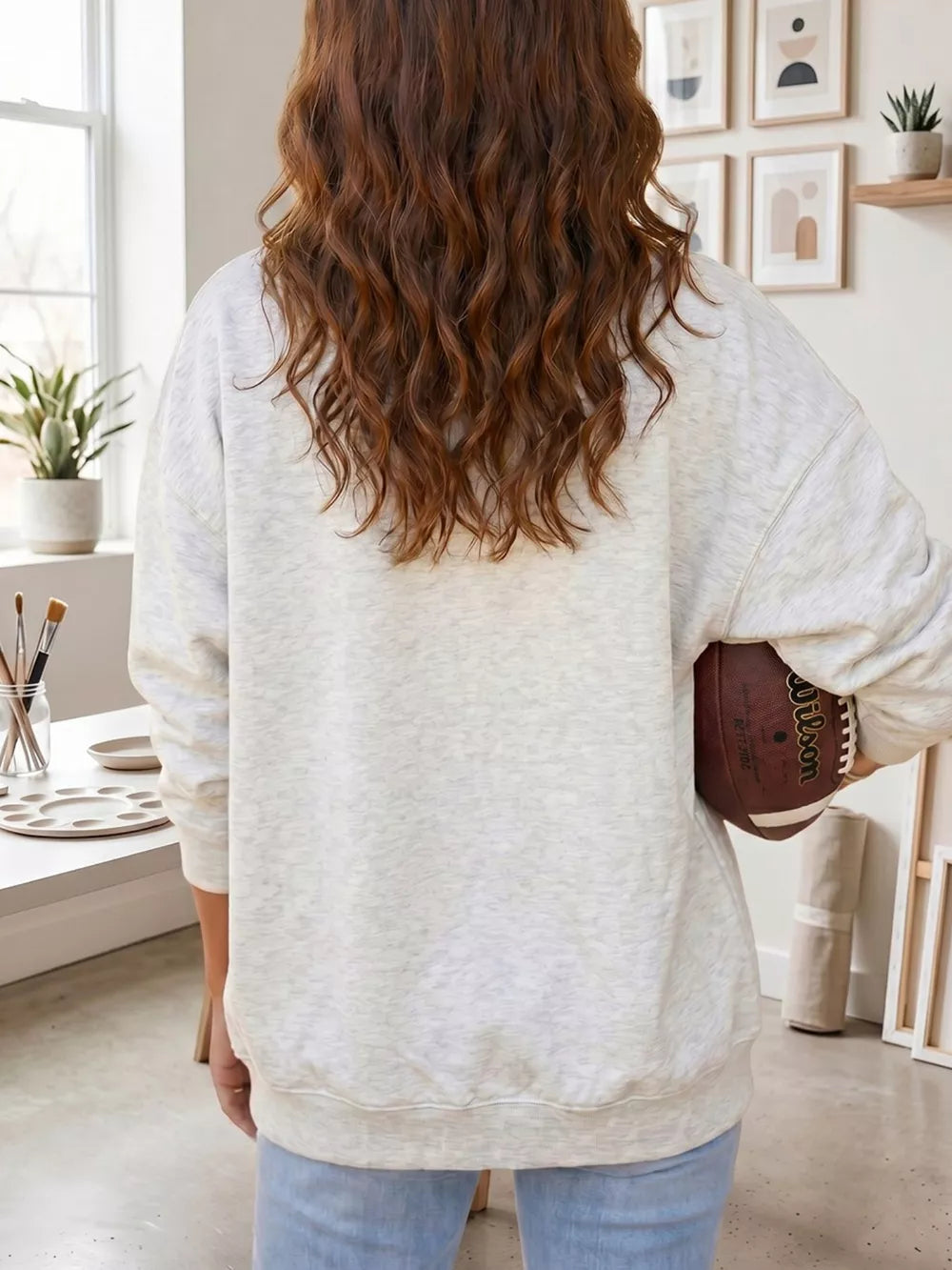 50% polyester, 43% viscose, 7% elastane Care instructions: Machine wash cold zip-up sweater in heather grey with relaxed