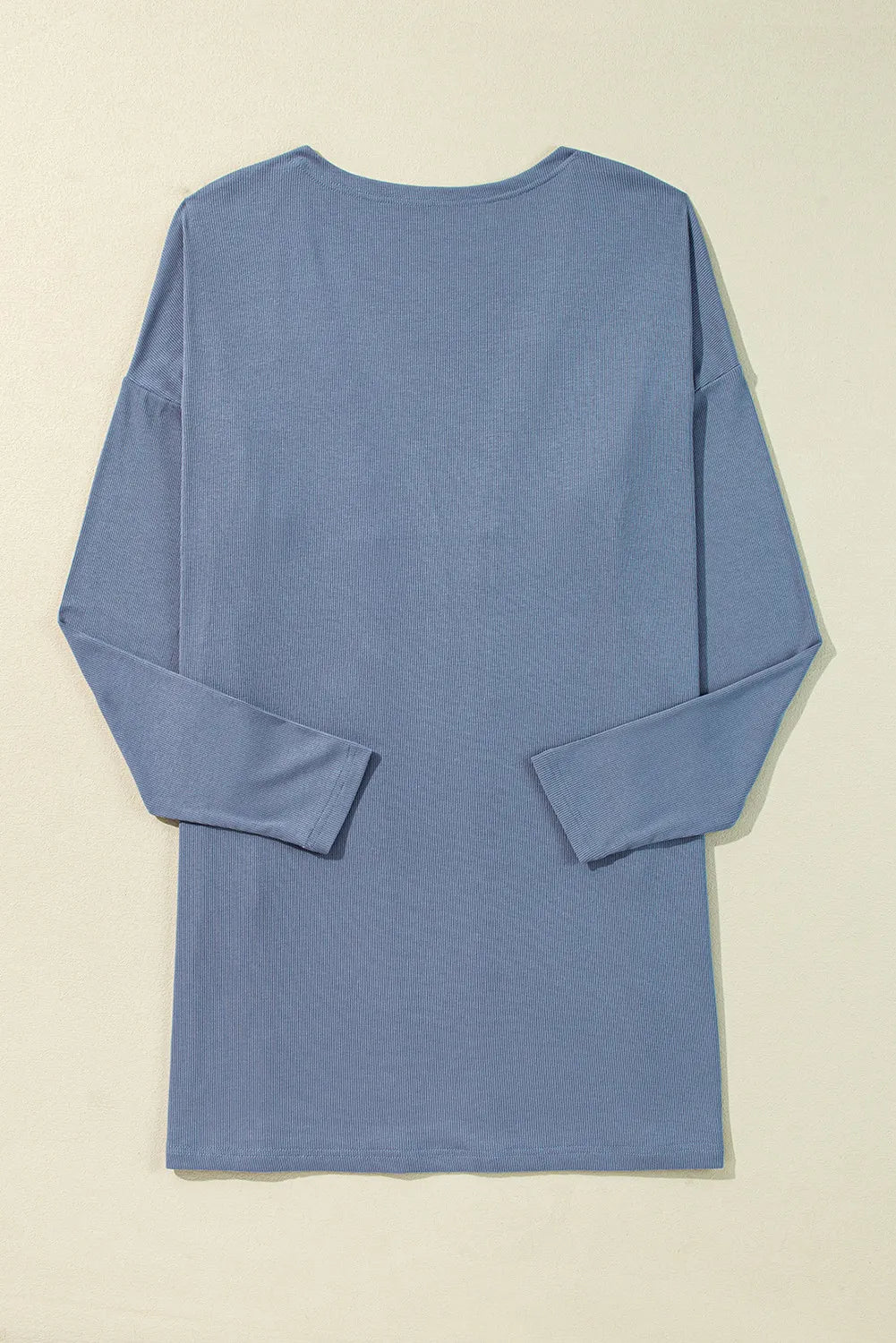 Dusty blue ribbed knit long sleeve cardigan with a relaxed fit.