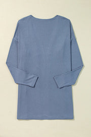 Dusty blue ribbed knit long sleeve cardigan with a relaxed fit.