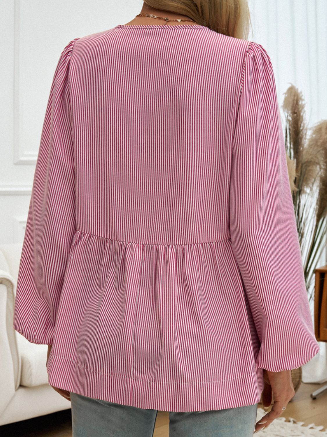 Red and white striped peplum blouse with puff sleeves and gathered waist