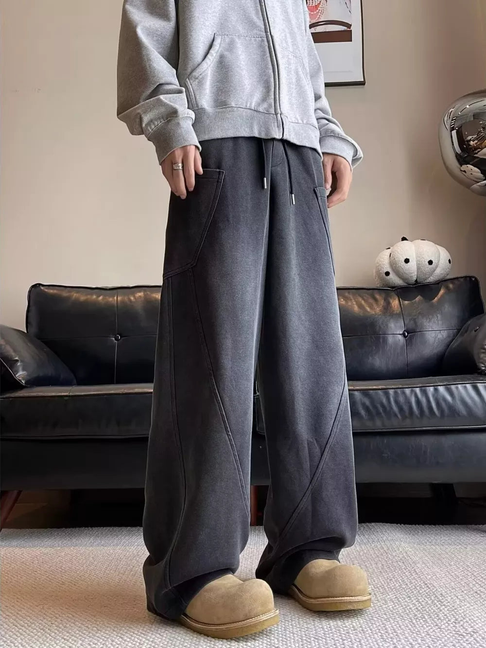 Men's charcoal vintage wash relaxed fit sweatpants with drawstring and pockets.