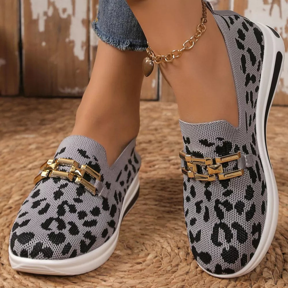 Gray leopard print mesh slip-on shoes with gold chain detail.