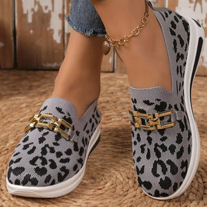 Gray leopard print mesh slip-on shoes with gold chain detail.