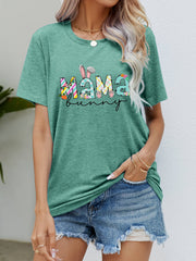 Mama Bunny graphic tee in Gum Leaf green with colorful patterned letters and bunny ears.