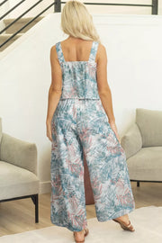 Botanical print two-piece set with wide-leg pants and square neck tank top.