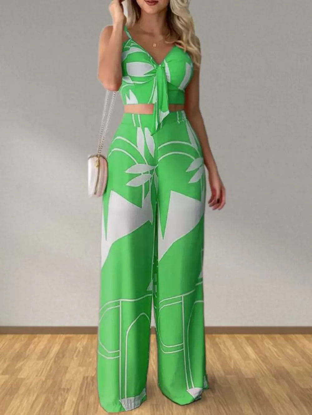 Light green tropical print crop top with tie front and wide leg pants set.